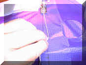 1.6sewing_on_line.jpg (108164 bytes)